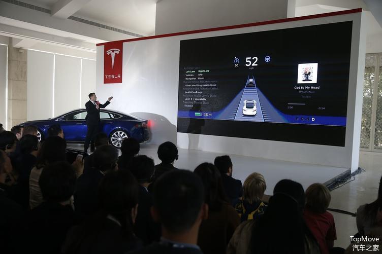 马斯克在中国发布 Autopilot | 视觉中国